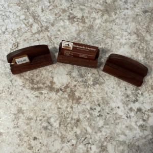 set of three wooden business card holders sitting on a marble table top